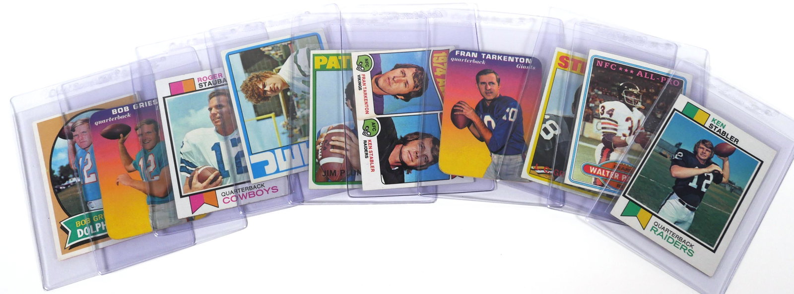 10 Vintage Football Cards Payton Griese Staubach: Lot of 10 vintage Topps football cards including: Roger Staubach, John Riggins, Jim Plunkett, Fran Tarkenton, Ken Stabler, LC Greenwood, Walter Payton and Bob Griese. Please check our other auction lo