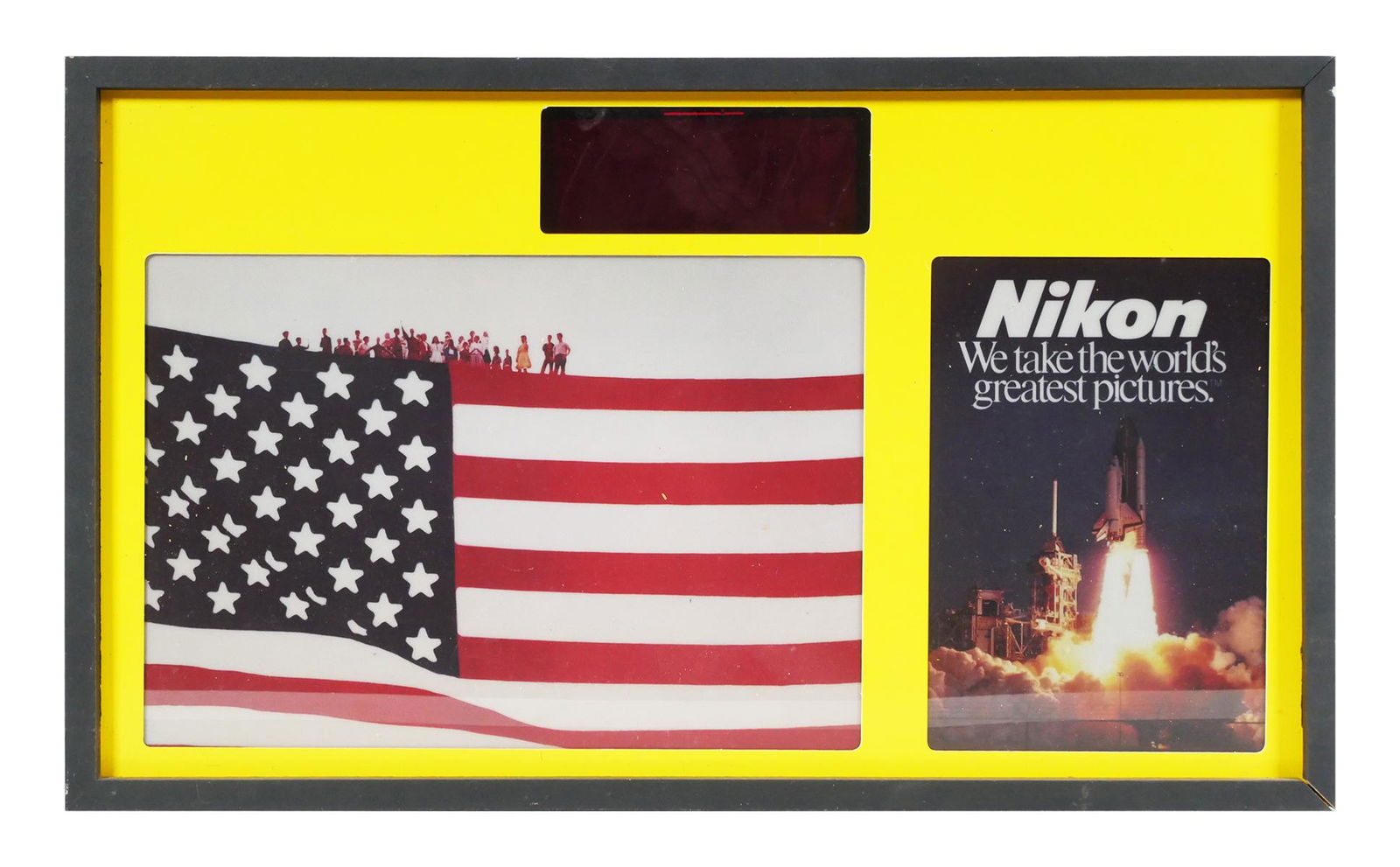 Vintage Nikon Camera Dealer Sign LCD Clock: Nikon dealer camera shop lighted sign with LCD clock. Sign measures 21" x 12" x 5" deep. Clock is working, light may need to be replaced. Sign has American flag on face, minor wear to case. Please see