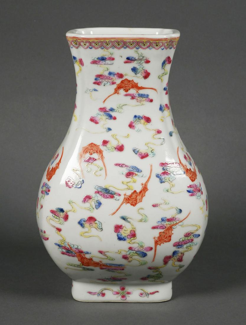 Antique Guangxu Famille Porcelain Bat Vase: 1874-1907 Guangxu bat and famille vase. Hand painted with vibrant colors. Chinese six red character mark on base. Very good detail on porcelain. Vase measures approx. 10" tall x 6 1/2". Top opening 2 