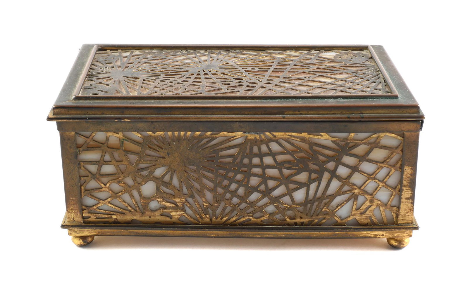 TIFFANY STUDIOS Pine Needle Bronze Box: Antique circa 1910 Tiffany Studios #816 gilt bronze and slag glass box, measuring about 6-1/2" wide and 2-7/8" high. Chips on one end panel and the bottom panel -- chip pieces included. Gilt wear, pri