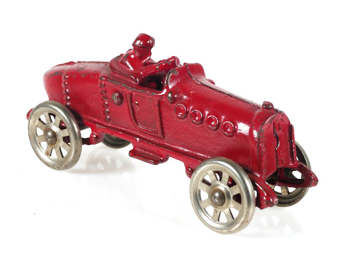 Antique Cast Iron Boat Tail Race Car: Red cast iron toy boat tail racer. Possibly AC Williams or Hubley. 5 1/4" long x 2 1/2".
