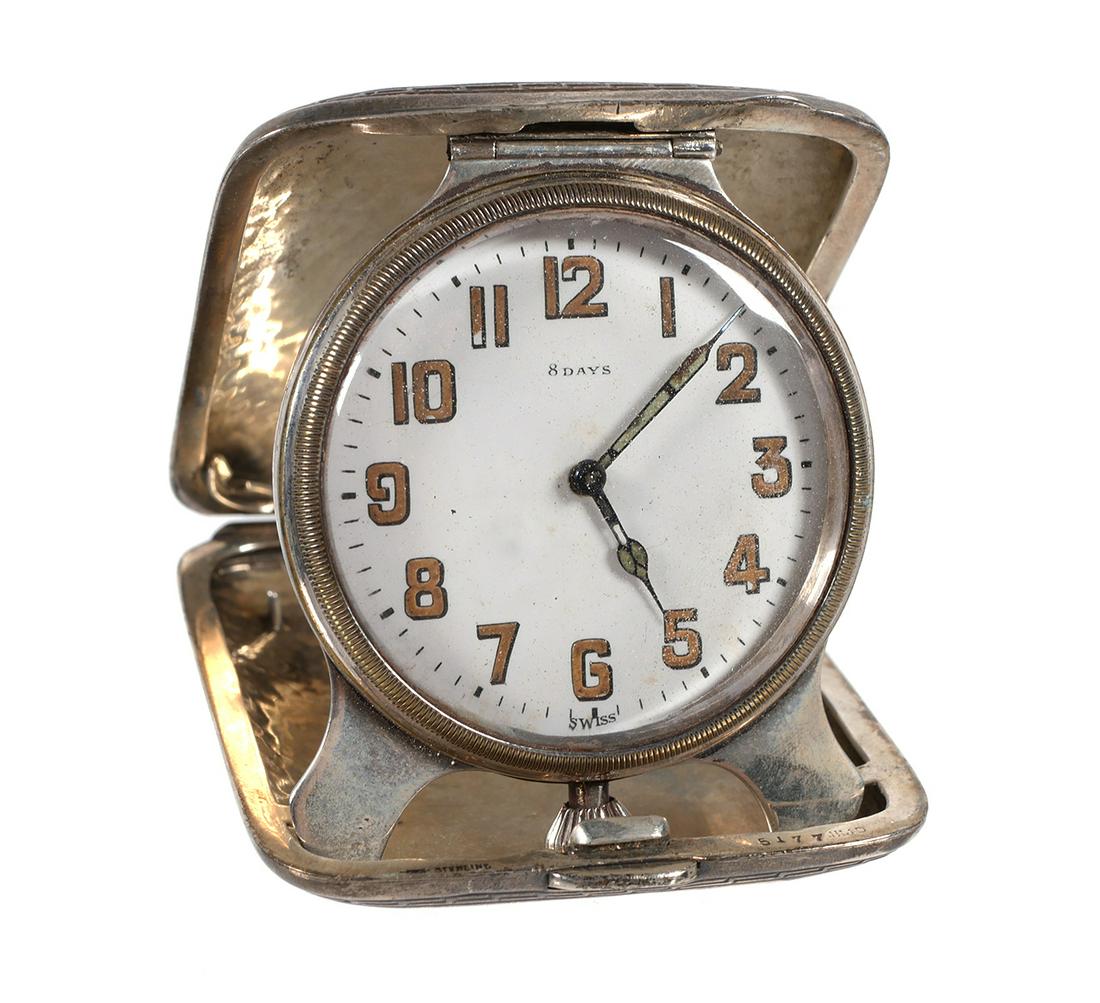 Majestic Watch Co 8 Day Travel Clock Sterling Case: Antique Majestic Watch Co., 15 jewels, 8 days travel pocket watch clock with sterling silver hammered case. Case measures 3" x 2 3/8", weight 68.9 gram, monogrammed. Watch runs.