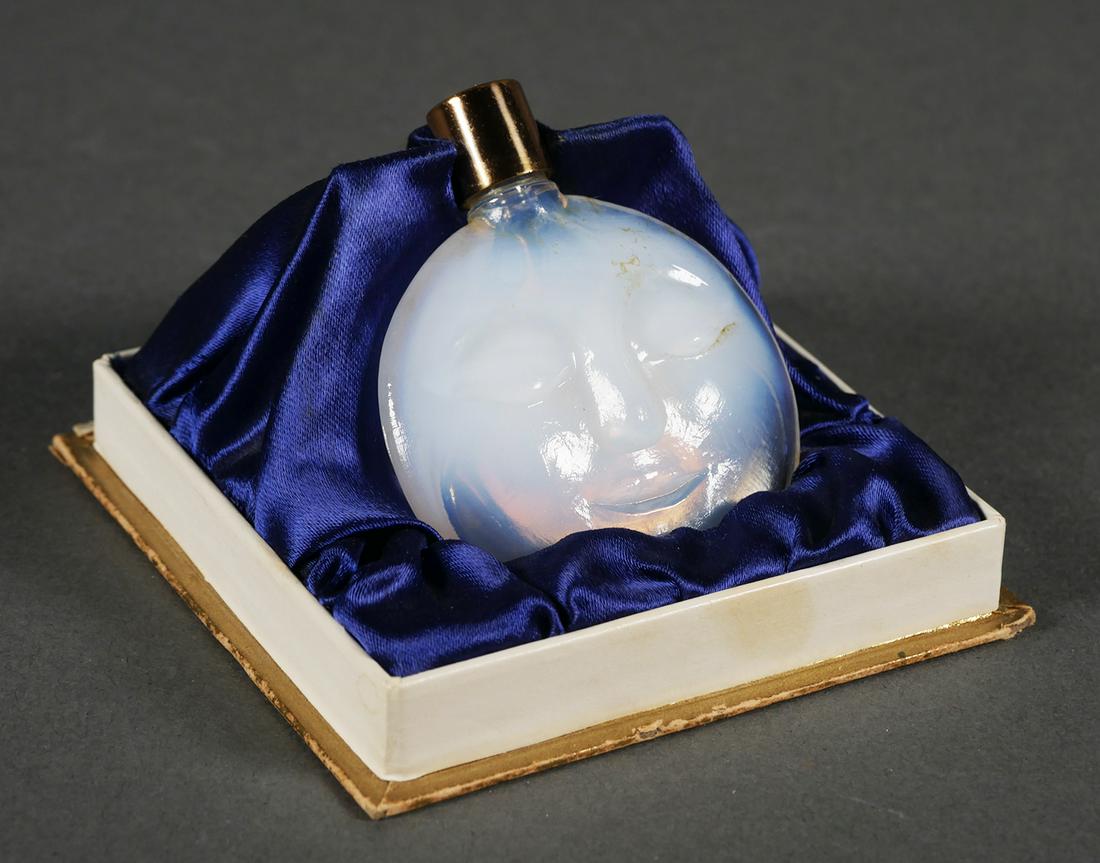 Rare Lancome SPUTNIK Perfume Bottle in Box: 1959 Lancome Magie perfume bottle, opal glass, with foil label and original box. Measures 2" diameter. Reportedly only 100 of these were made to celebrate Sputnik launch. Please search this auction fo