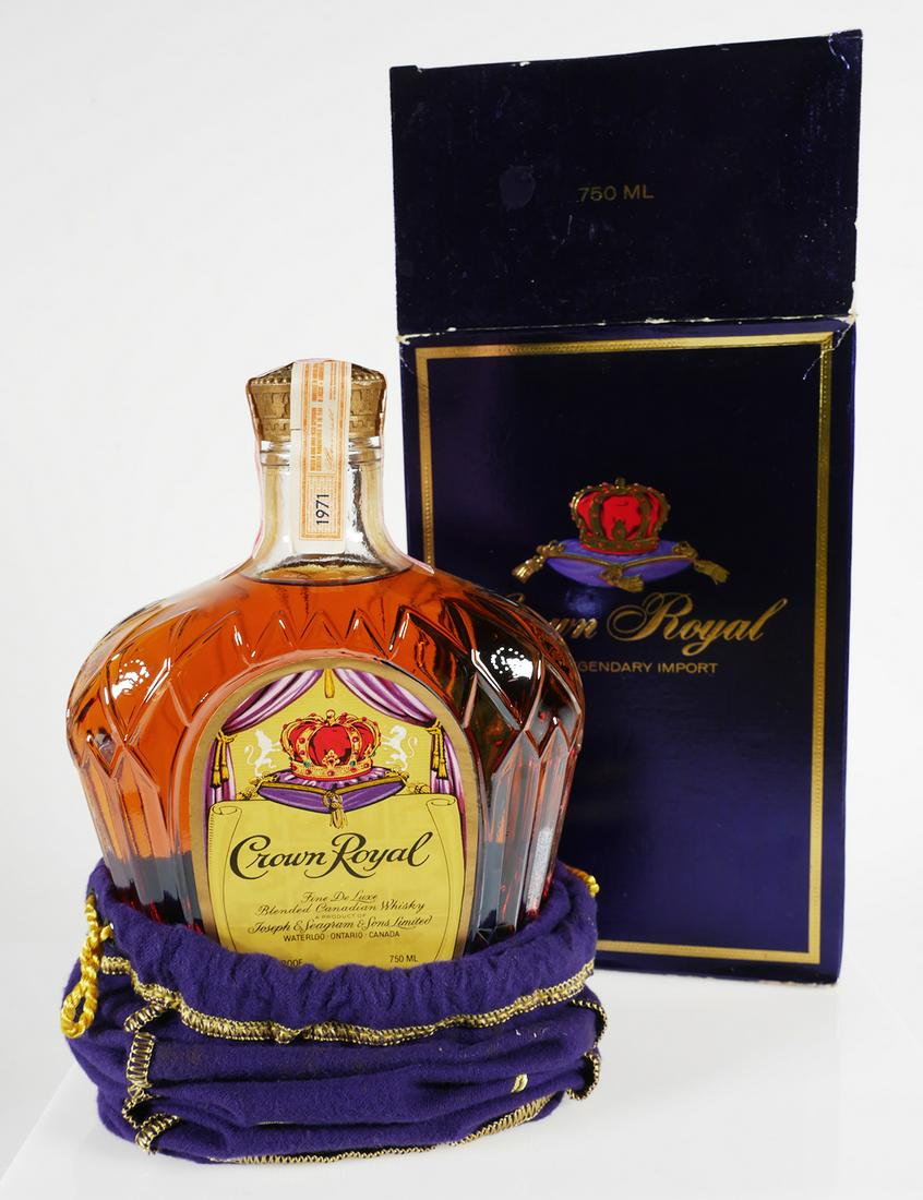 Sealed Vintage Seagram's Crown Royal Whisky: Unopened bottle of Seagrams Crown Royal Canadian blended whiskey, 750ml. Seal is dated 1971. Seagram's Royal Crown purple pouch and box included. PLEASE NOTE: This item is being sold as a collectible