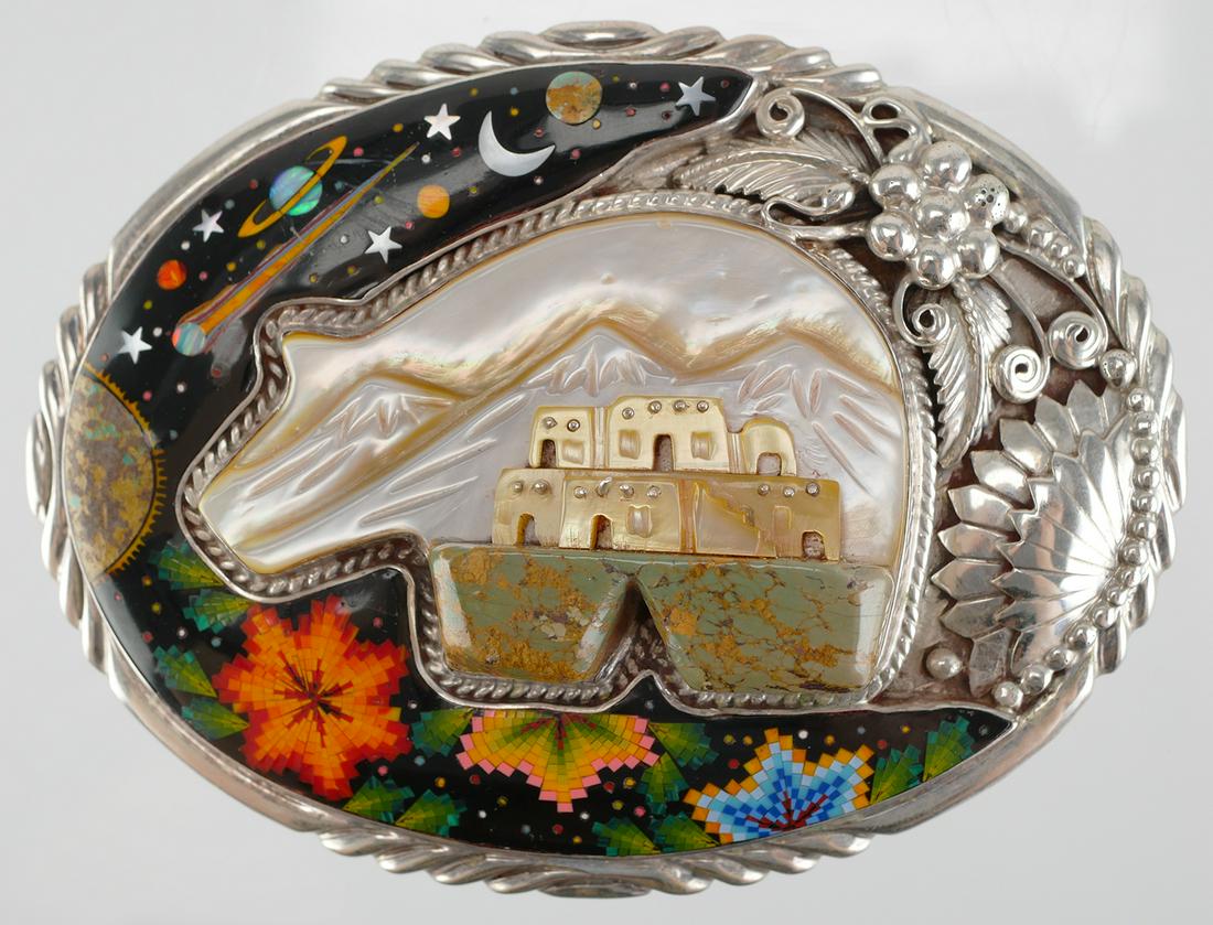 Sterling Turquoise Coral Onyx Inlay Belt Buckle: Native American style sterling silver oval belt buckle featuring a MOP bear with the outline of mountains and raised building. Oval border has cosmic design with multi-color micro inlay in turquoise, 