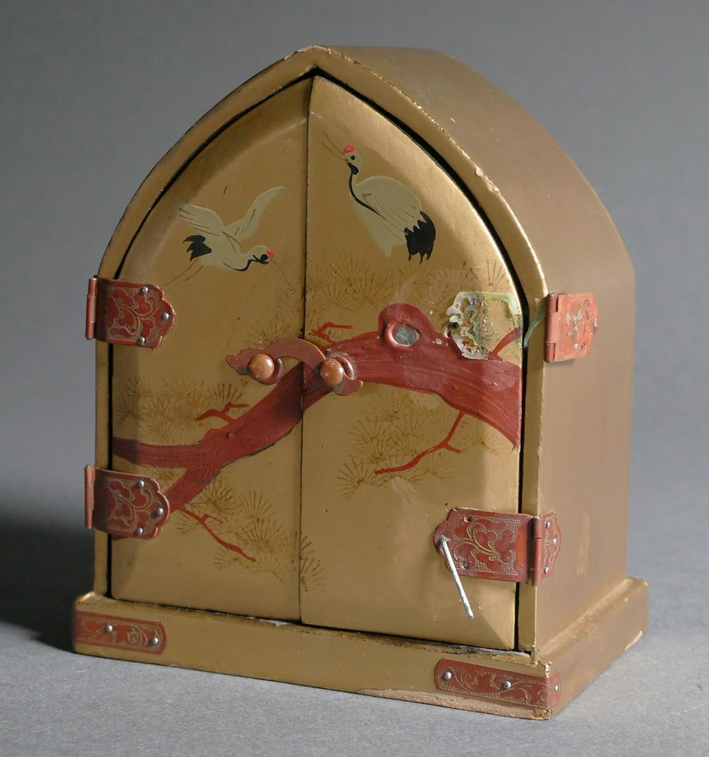 Vantine Hi Yang Perfume Bottle: Vantine Hi Yang crystal perfume bottle with lacquer wood box, c. 1915, Flacon shaped as the figure with the head as the stopper, one hinge on box has detached, bottom has a sticker that reads “g