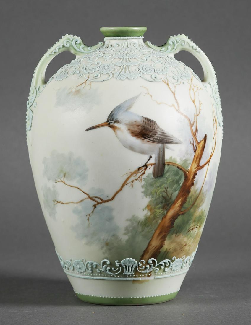 Japanese Nippon Moriage Kingfisher Porcelain Vase: Antique Japanese Nippon vase. Porcelain vase is moriage decorated and features a hand painted kingfisher bird and double handles. Maple leaf mark to underside. Mark was used by Morimura Gumi as early 