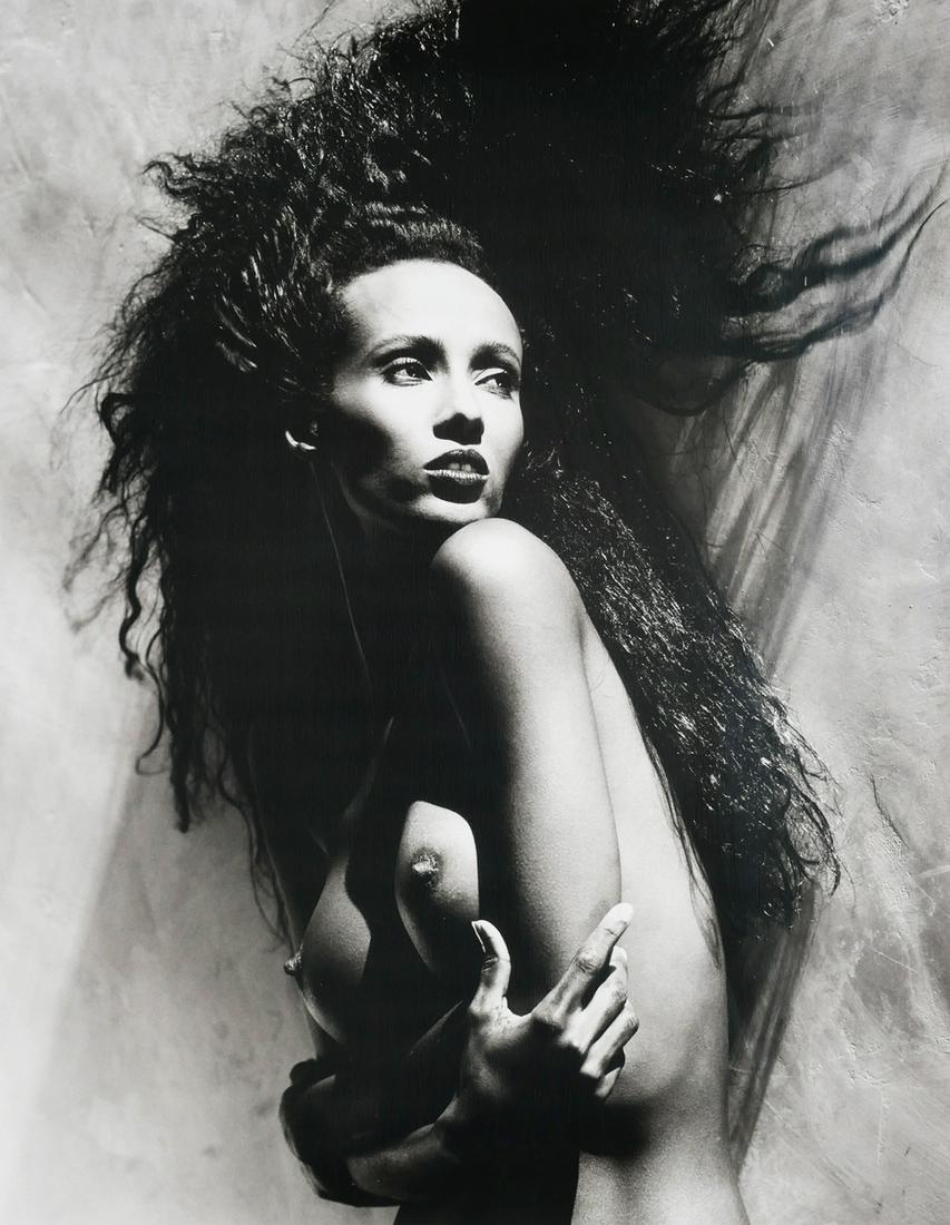 GREG GORMAN, Iman Nude Portrait, Signed: Silver print photograph of supermodel Iman, by Hollywood celebrity photographer Greg Gorman. Signed at the lower right margin. Photograph 1988, print later. Image measures 19" x 13 1/2", framed to 26