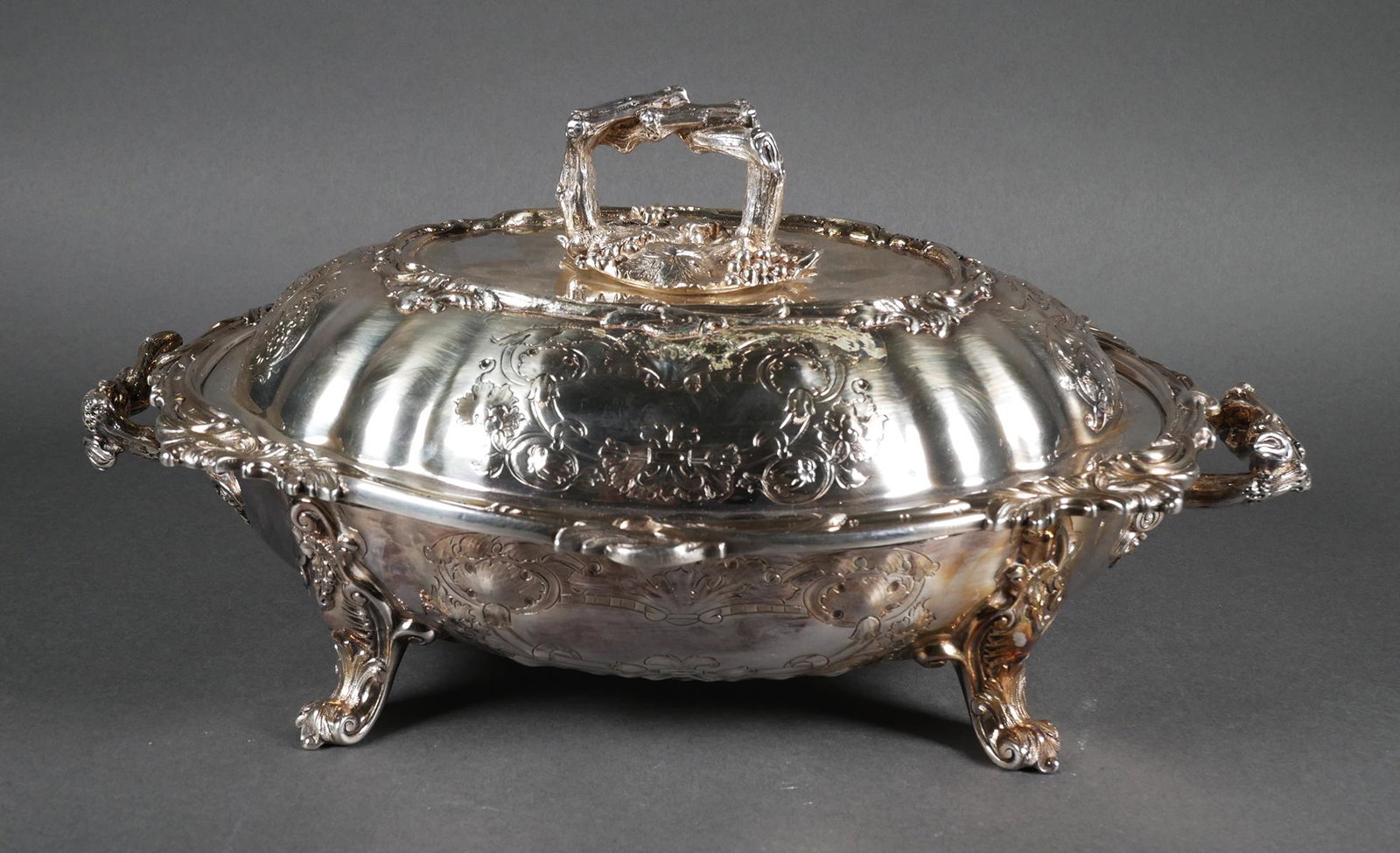 Antique Martin Hall & Co Silverplate Server: English silverplate server with insert by British manufacturers Martin Hall & Company. Dish has ornate scroll work with floral motif. Serving dish measures approx. 14 1/2" long x 6 3/4" tall x 9 3/4" 