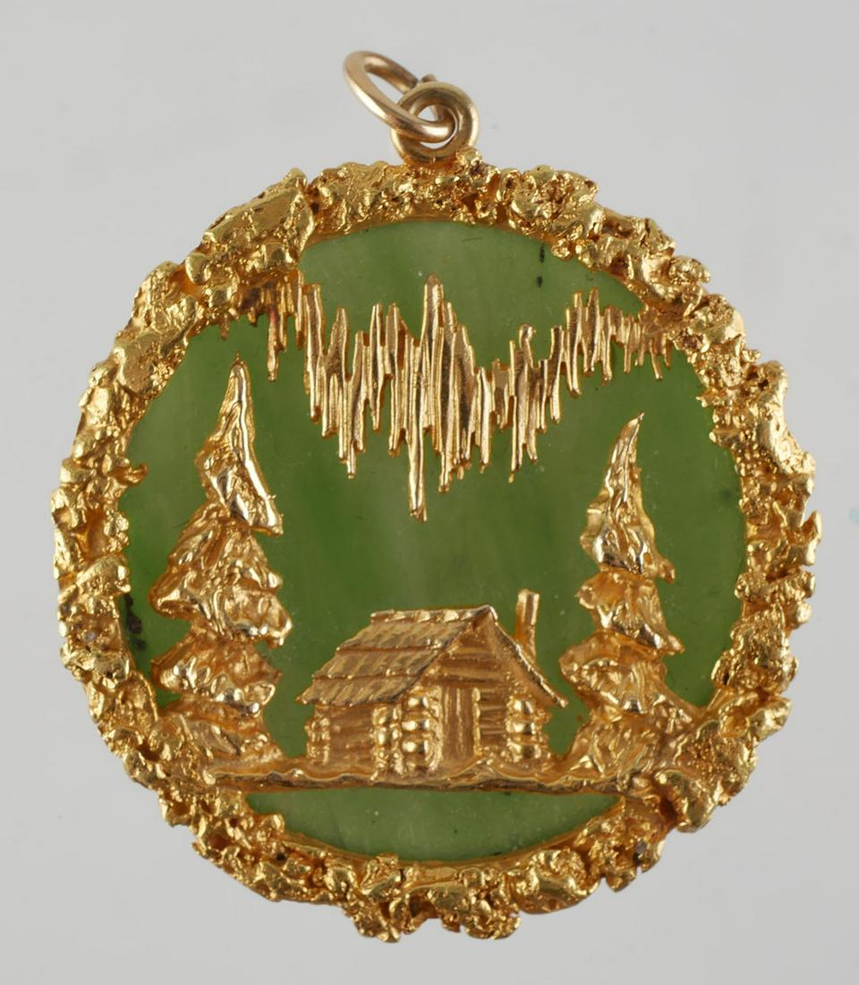 18k Gold Aventurine Bezel Pendant: Dark green Aventurine gemstone is the background to the pretty log cabin in the forest style scene set in 18 karat yellow gold. Pendant measures 38mm with bail and weighs 13.7 grams. It is marked HOUS