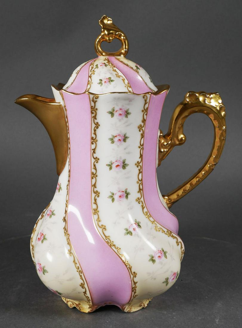 Antique C. Ahrenfeldt Limoges Chocolate Pot: Rare antique C. Ahrenfeldt Limoges pink rose floral motif chocolate pot or hot water jug with gold gilt detailing. Pot measures about 9.75 inches tall x 7 inches from handle to spout. Marked C. Ahrenf