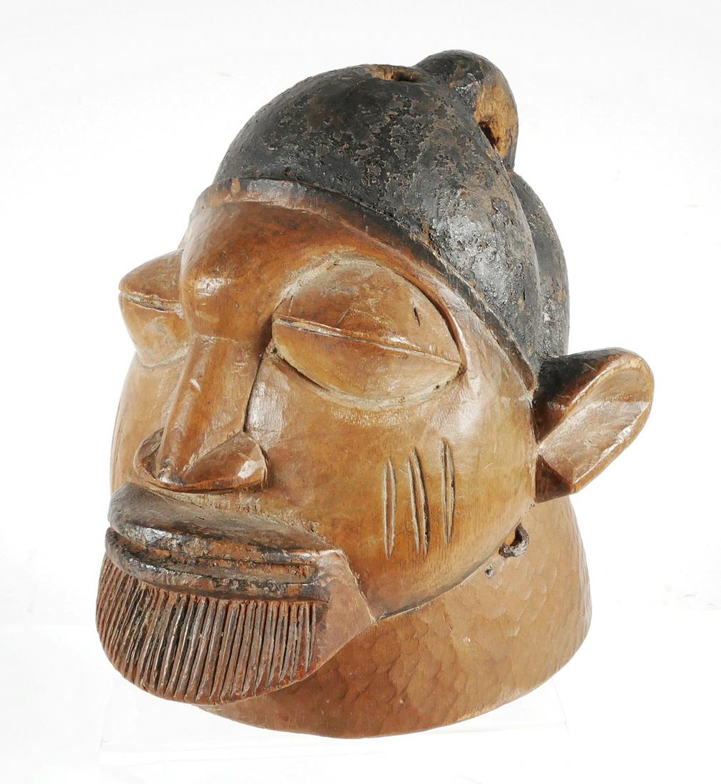 Antique MAKONDE Lipico Mask Mozambique: Old African mask or bust, carved. Does not fit over the wearer's head, but presumably atop it -- apparently most of these had fabric or hair hanging off of them, which hid the wearer's face. The loope