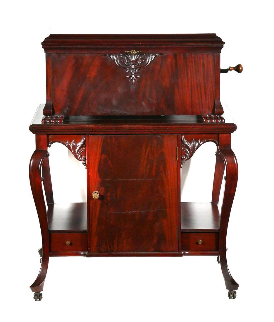 Empress CONCERT GRAND Music Box: Top of the line at the time, made originally by Lyon & Healy. Comes with base cabinet. Measures 29" wide, 22" deep and 14" high. Comes with about a dozen metal discs. This item will need to be shipped