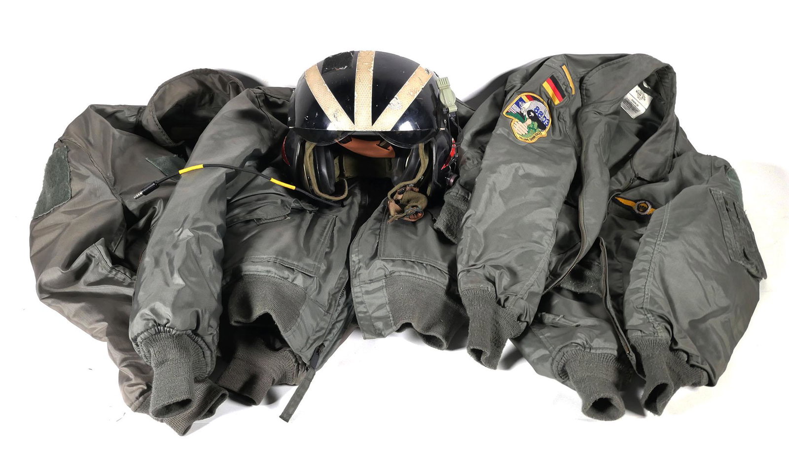 Vietnam Era Gentex Helmet & (3) Flight Jackets: Vietnam War era US Gentex SPH Double Visor Helicopter Pilot Flight Helmet with Sonex Noise Reduction system, including microphone. Also included are three flight jackets. One CWU-45P Cold Weather Type