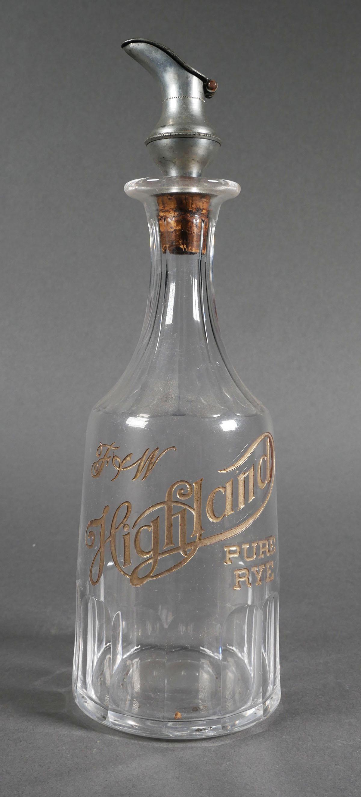 Pre-Prohibition Rye WHISKEY Decanter: Early bar decanter with pourer, with carved and gilt lettering, "F&W Highland Pure Rye." Measures 8-7/8" to lip of bottle. Ground pontil. This item can be shipped in-house.