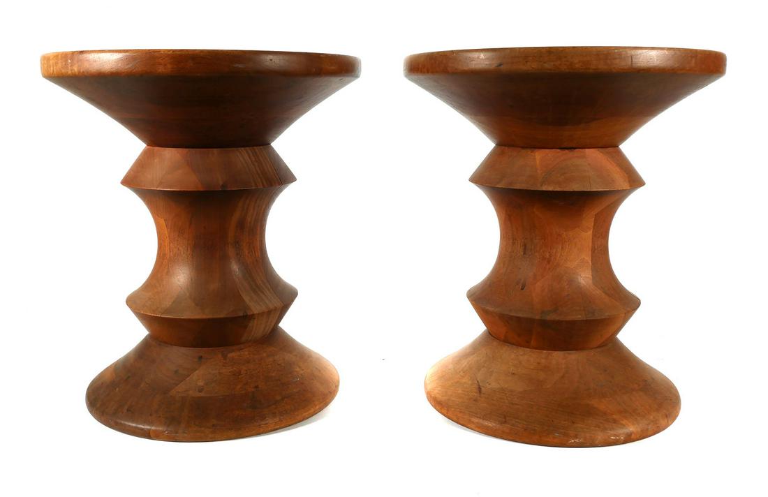 Pair EAMES Walnut Time-Life MCM Stools: Designed by Charles & Ray Eames to be used as a low table in the Time Life building in Manhattan. Made by Herman Miller. Approx. 15-1/2" high and 13" diameter. This item will need to be shipped by a p