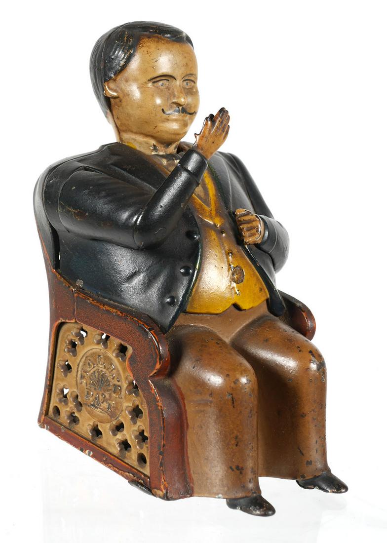 Mechanical Bank: TAMMANY HALL, 1875: Antique cast iron mechanical J.E. Stevens "Tammany Hall" bank. Measures 5-7/8" high. This item can be shipped in-house.