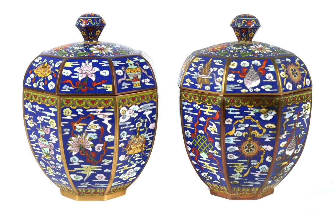 Pair of Cloisonné Ginger Jars: Two matching eight sided enamel jars with lids, Asian, probably Japanese, each measure 8 1/2 with lid, 5 1/2 inches without lid. This item will need to be shipped by a packing company of your choice. 