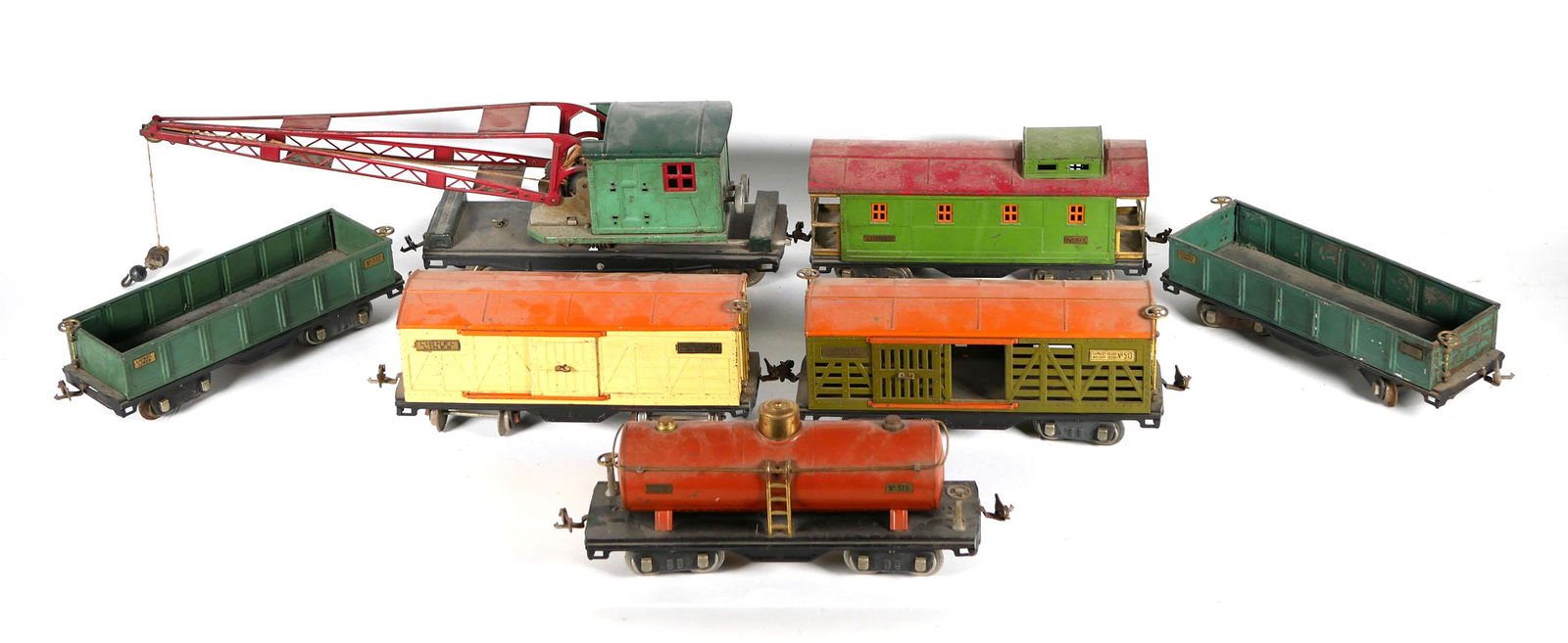 Lionel Lines Standard Gauge Train Set: Set of seven Lionel Lines toy train cars including car no. 514, no. 513, observation no. 517, car no. 515, two trailer car no. 512, and crane car 219 measuring 17 inches in height. Please see our othe
