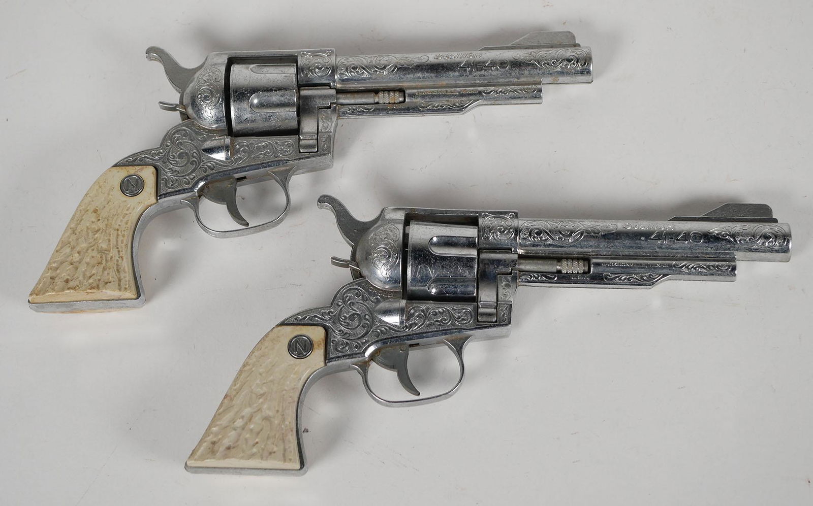 Pair of Nichols toy cap guns. (1 of 5)