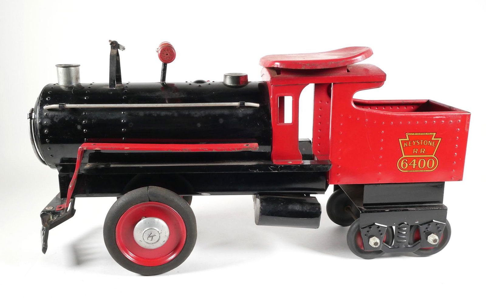 Keystone RR Ride-On Toy Train: Keystone Railroad train 6400 ride-on toy, pressed steel, measures 13 x 27 x 7 inches. This item will need to be shipped by a packing company of your choice. We maintain a list of reliable shippers, or