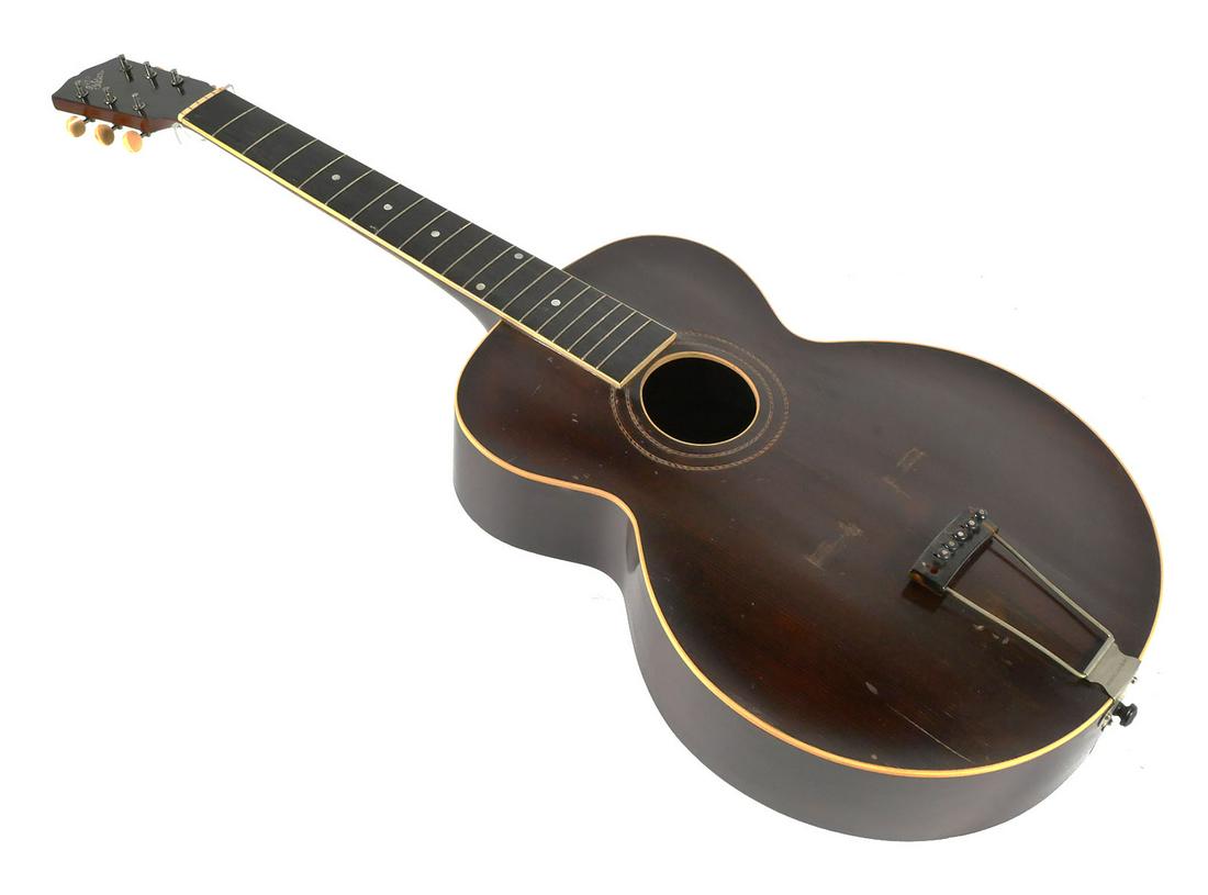 1918 Gibson L-1 Archtop: 1918 Gibson Acoustic Guitar, serial # 46666. Case appears original. Case overall approx. 43" L x 18" W x 6-3/4" H. This item will need to be shipped by a packing company of your choice. We maintain a 