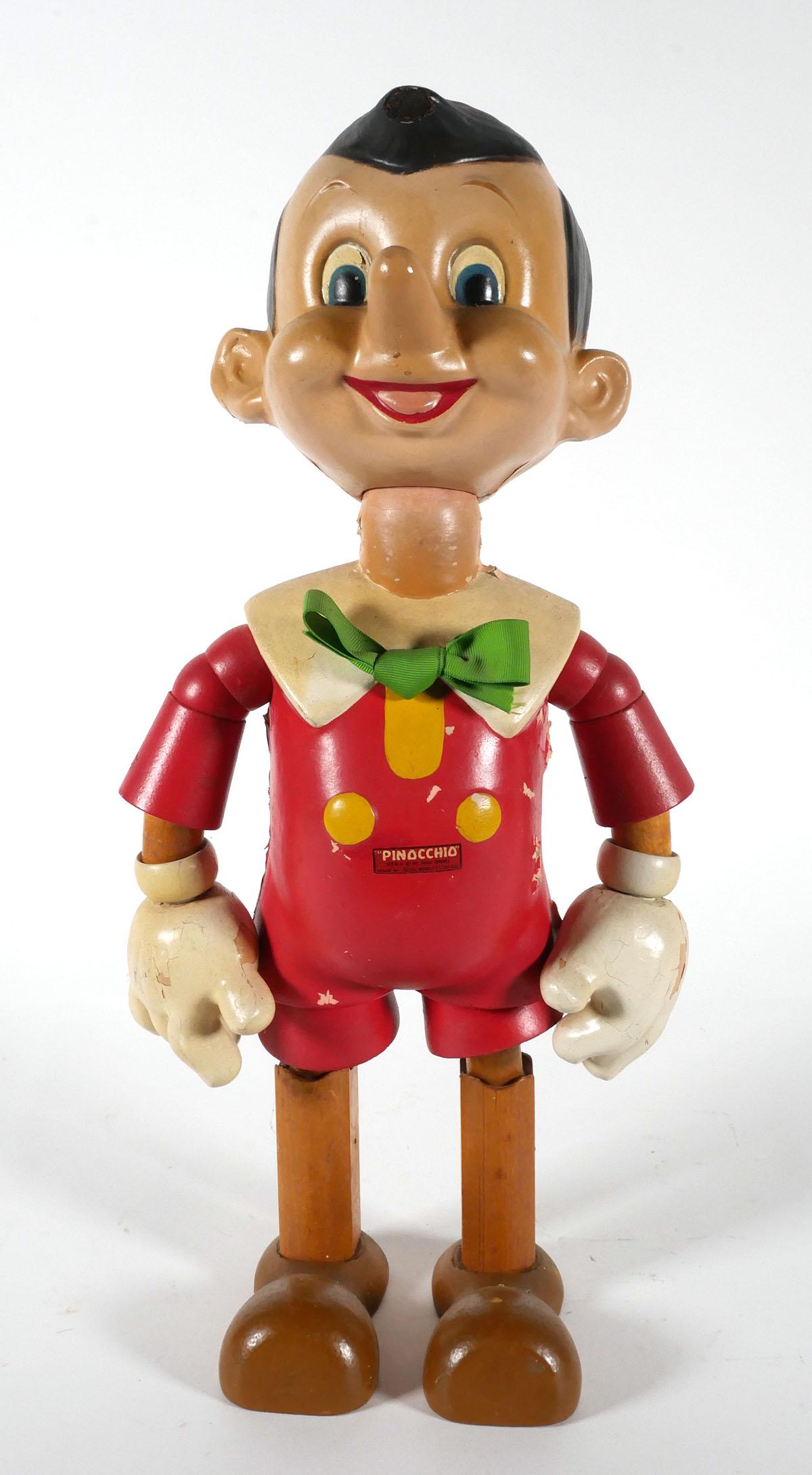 Vintage Disney 19" Pinocchio Jointed Doll: Vintage Walt Disney Pinocchio wooden and composition material jointed doll made by Ideal Novelty & Toy Company, measures 19 x 11 x 7 1/2 inches. This item can be shipped in-house.