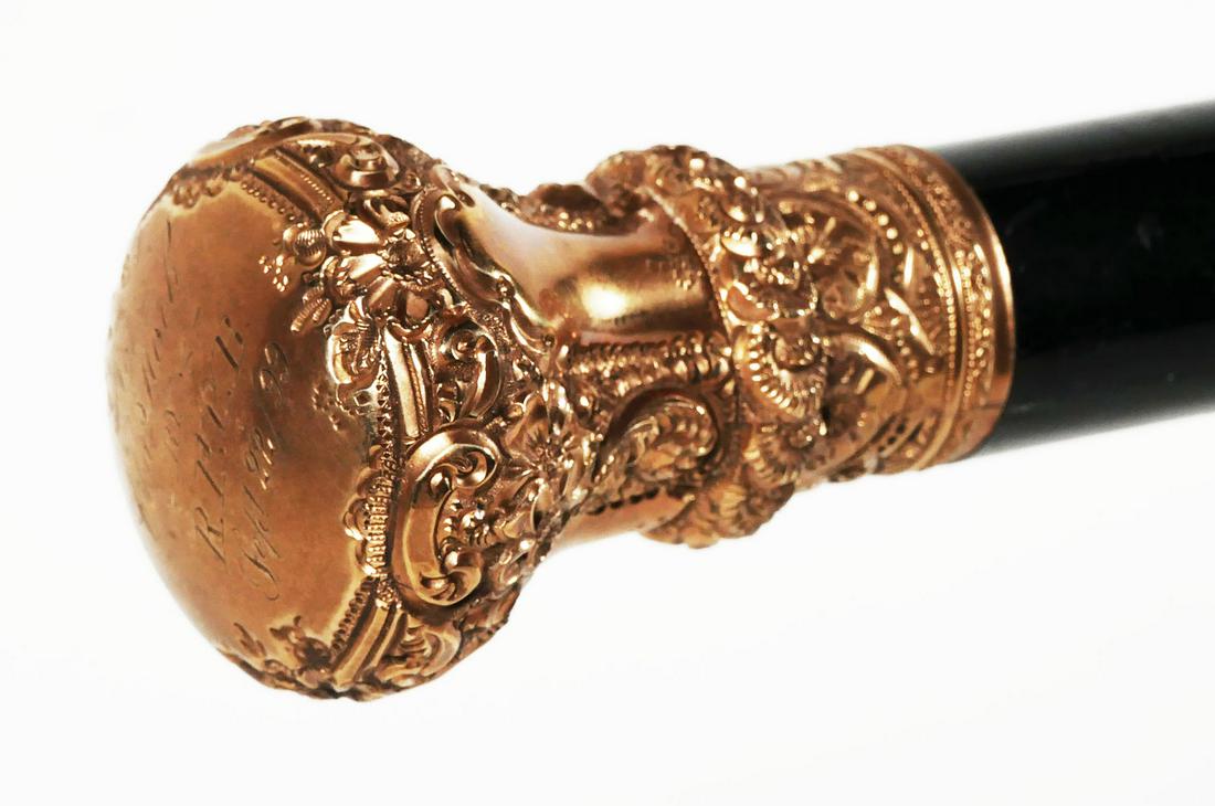 10k Gold Handle 19th C. Presentation Cane: Antique ebonized wood walking stick with knob handle engraved "To Chas Koch by R.P.C.B. Sept 22 99" Marked with an "S" within a shield, likely for Simons Bro & Co, who eventually sold their patterns t