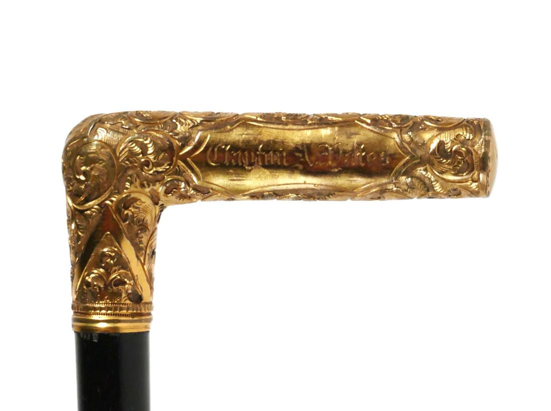 14k Gold Handle Gentleman's Cane: 19th C. antique ebonized wood walking stick with an "L" shaped handle inscribed with what appears to be the name Clayton A. Yates, and June 29,1883. Marked 14k and with the maker's mark "RFS & Co." Ap