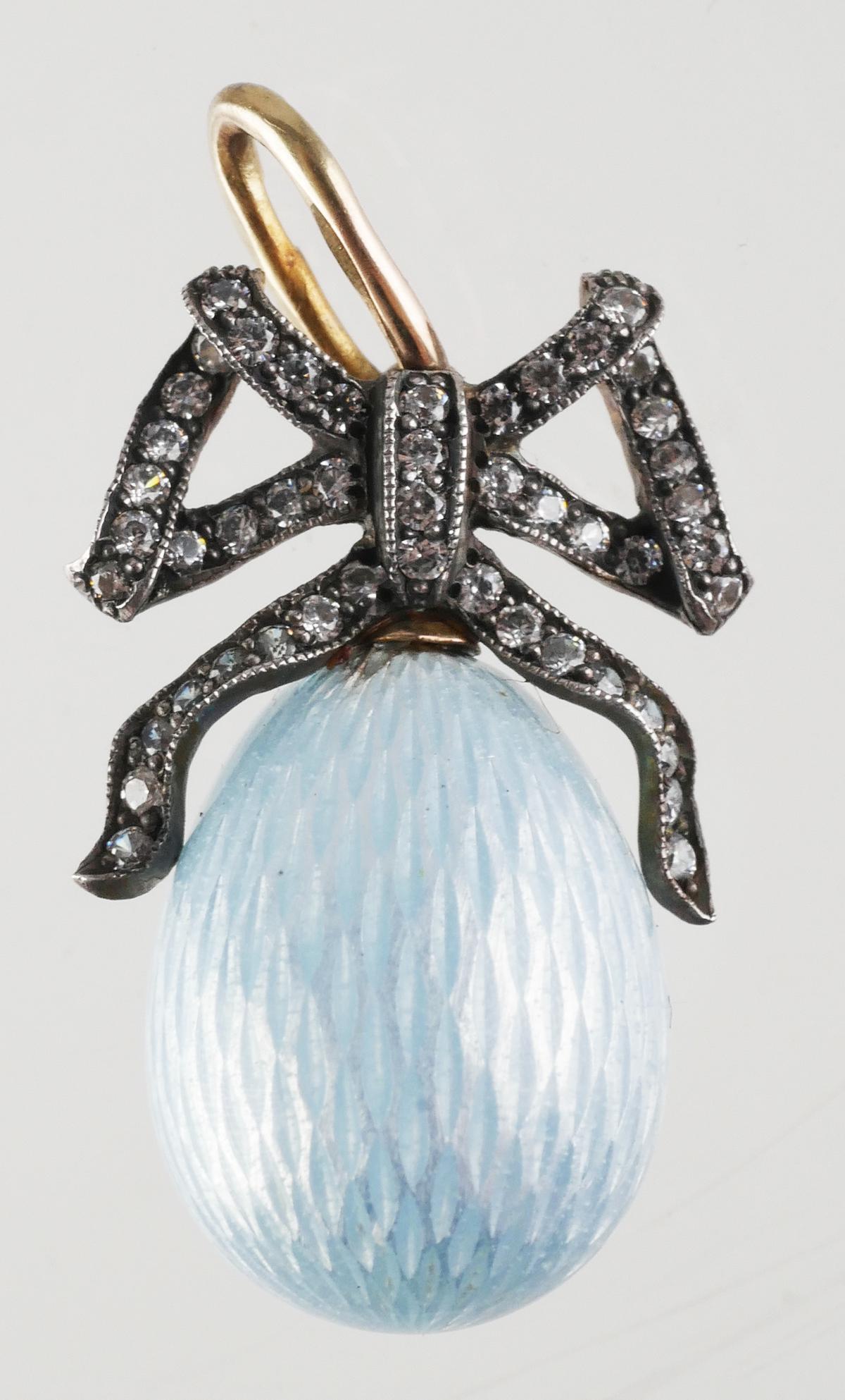 Russian Blue Enamel Diamond Bow Egg Charm: Faberge style egg design, robins egg blue enamel charm with diamond bow details on top, marked "960" Silver, star and "585" for 14K Gold, Russian hallmarks on jump ring, pendant measures 1" x 1/2", to