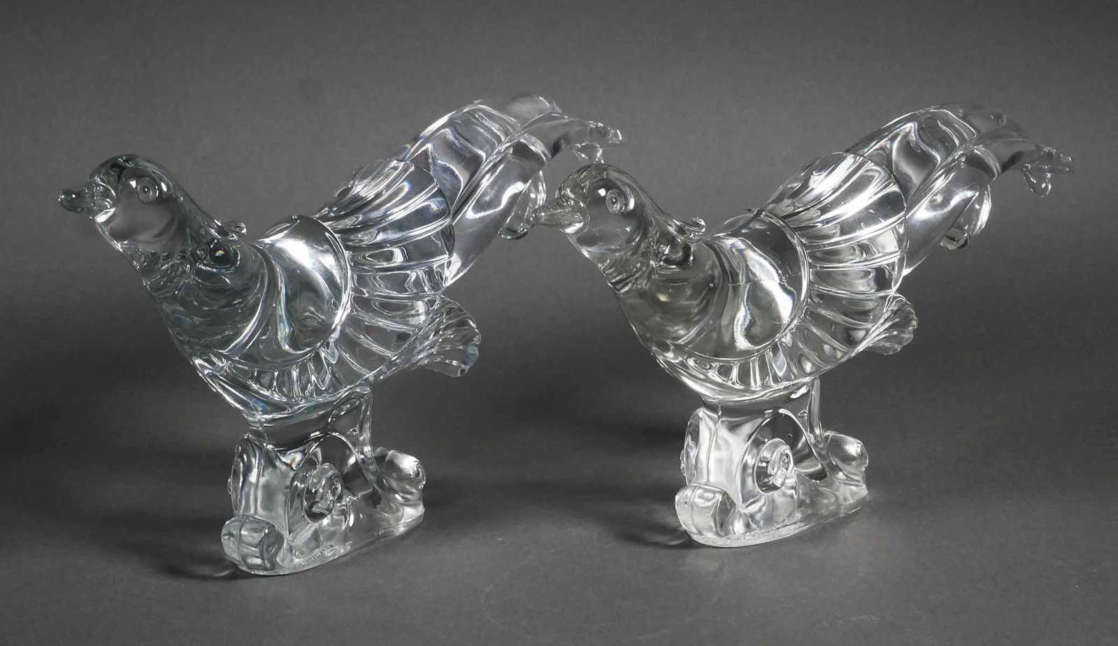 Pair Vintage Paden City Glass Pheasants: Clear crystal pheasants, made by Paden City Glass Manufacturing, mid 20th century. Each measure 6" x 13 1/2" x 3" (HWD). This item will need to be shipped by a packing company of your choice. We maint