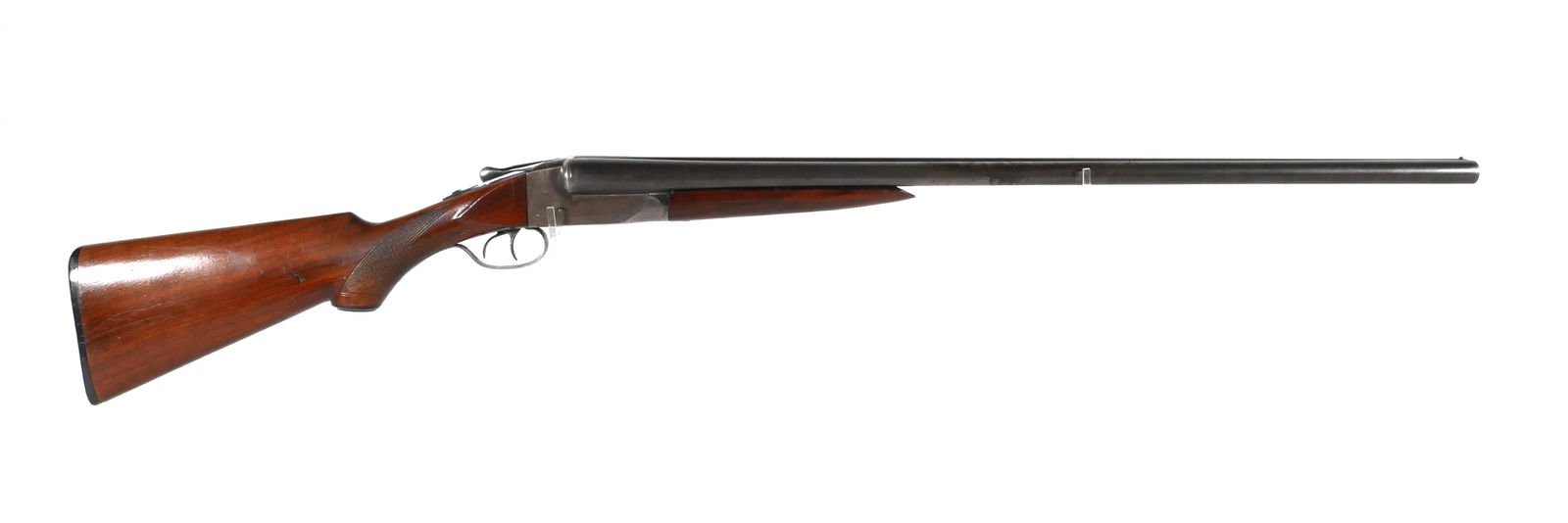 ITHACA Gun Co. Double Barrel Shotgun 12 Ga: Ithaca Flues model field grade side by side 12 gauge. Serial #328520. Barrels measure approx. 30", 46 1/4" overall, 14" LOP. Barrel flats are marked "4" on left and "0" on right. This item can be ship