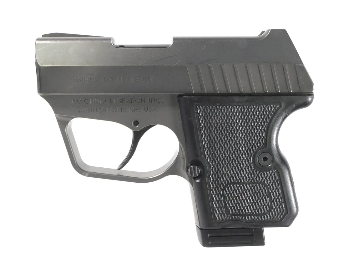 MAGNUM RESEARCH Micro Desert Eagle Pistol 380: Magnum Research Micro Desert Eagle sub compact pistol chambered in .380 ACP. Serial # ME05200. Pistol features nickel teflon finish, fixed sights, polymer grips, alloy frame and 2.2" barrel. Original 