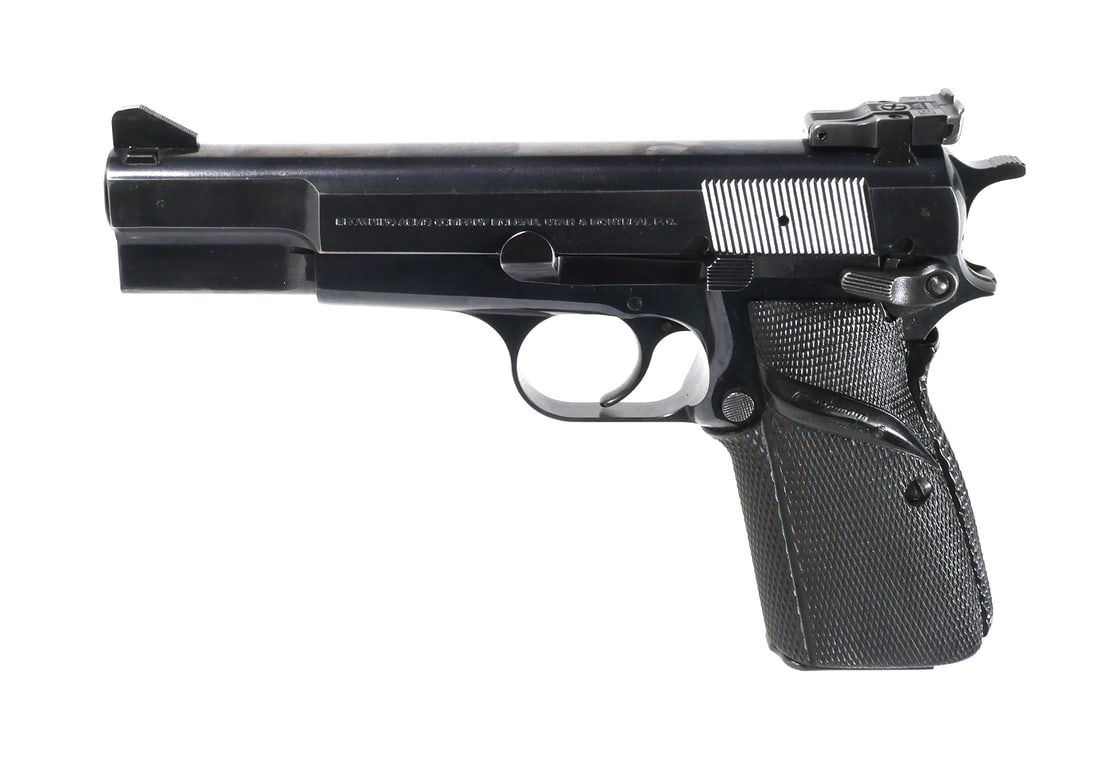 BROWNING Hi-Power Pistol 9mm: Browning Hi Power single action pistol chambered in 9mm. Serial # 245PN70883. Barrel measures approx. 4 5/8". Ambidextrous safety. Pachmayr signature model grips. (2) 13 round magazines included. Plea