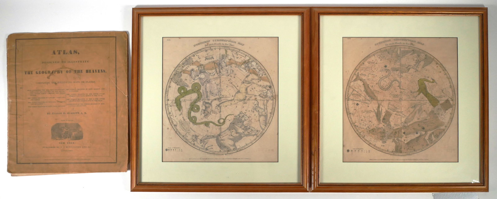Two Framed Prints Atlas Geography of the Heavens: Two 19C framed "Geography of the Heavens" and class book of astronomy featuring the Southern Circumpolar map for each month of the year and Northern Circumpolar map, with the original folio the works 
