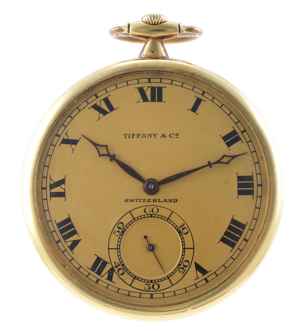 18K TOUCHON & CO Tiffany Pocket Watch: Touchon openface pocketwatch made for Tiffany & Co. 19 jewel movement #42630. Dial is marked Tiffany & Co Switzerland with roman numerals. 18K yellow gold case measures 43mm. Watch weighs 49.6 grams i