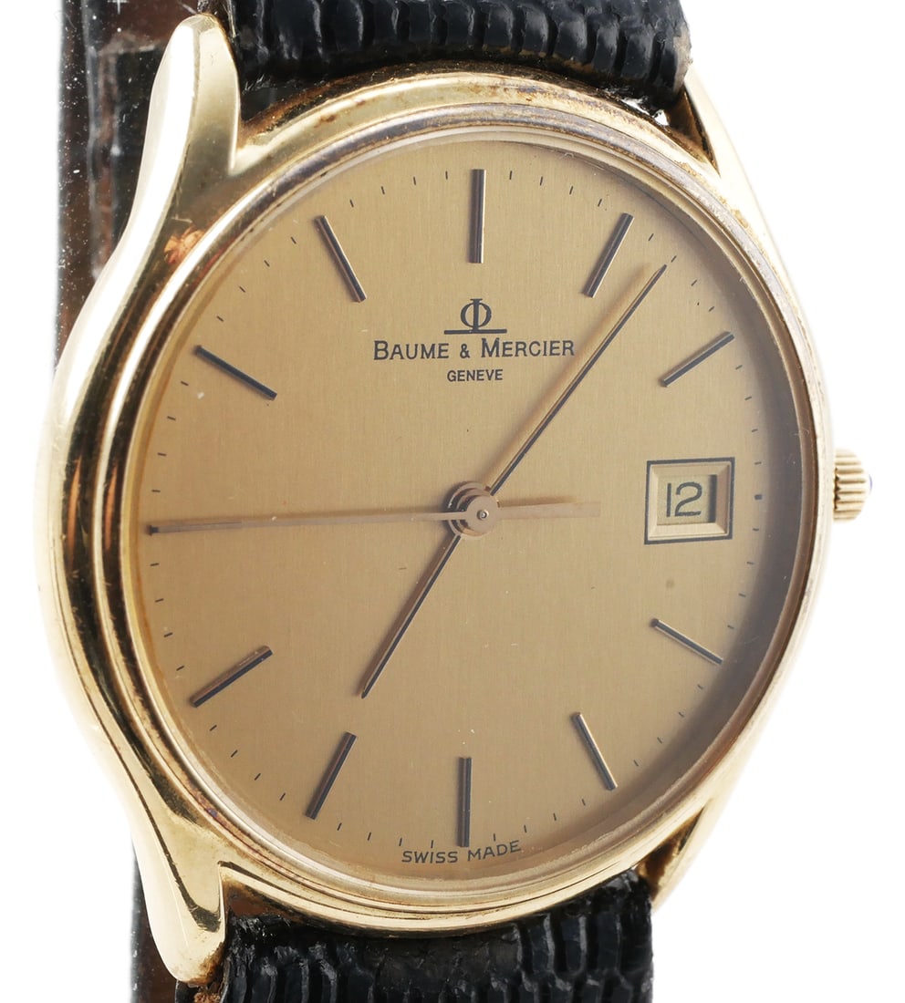 14K Gold BAUME & MERCIER Presentation Watch: Baume & Mercier 14K yellow gold presentation wristwatch. Quartz movement. Case measures 32mm, 16mm lug width. Model No: 95248. Overall length 9". This item can be shipped in-house.