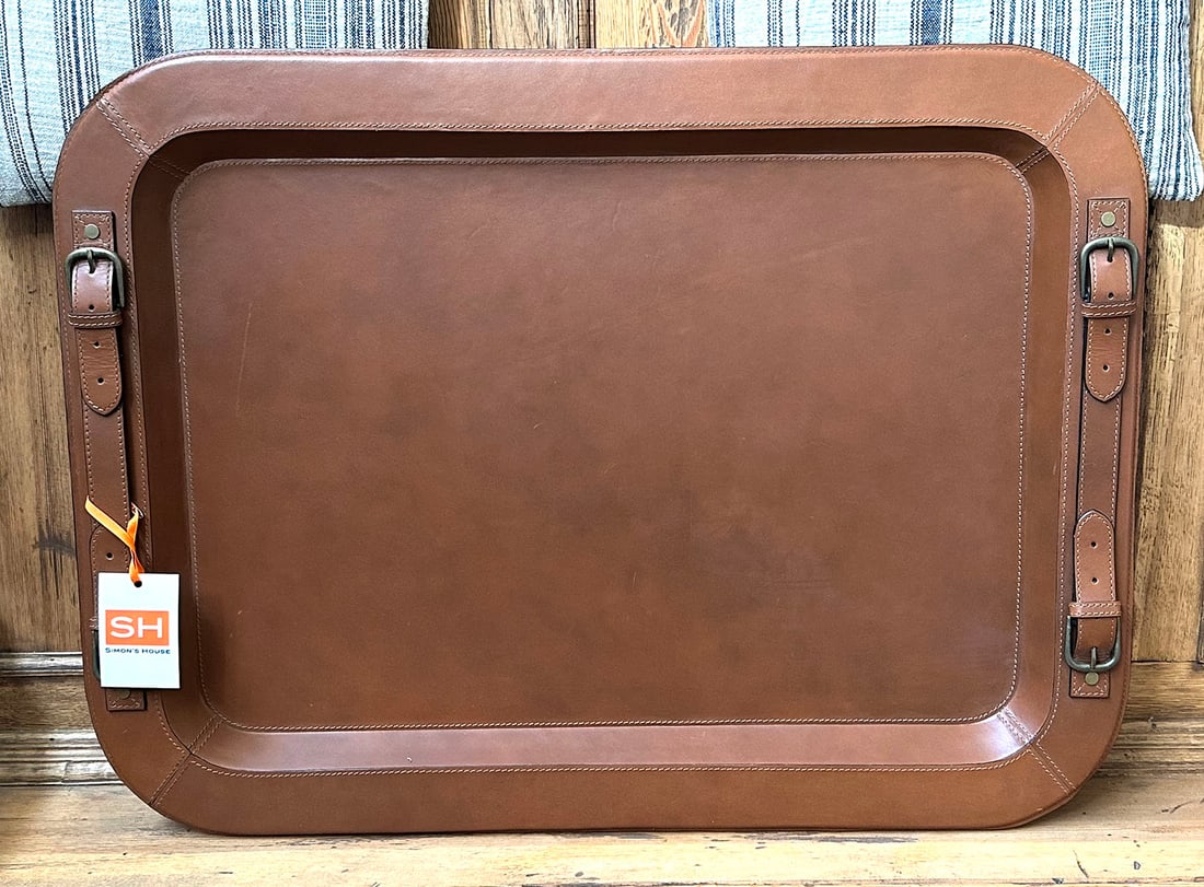 Ralph Lauren Hayden Leather Tray Large: Hayden Modern Thoroughbred with Saddle Leather Tray. Coordinates with the Gavin Tray Stand. Dimensions: 30"L x 22.5"W. MSRP: $1,250. This item will need to be shipped by a packing company of your choi