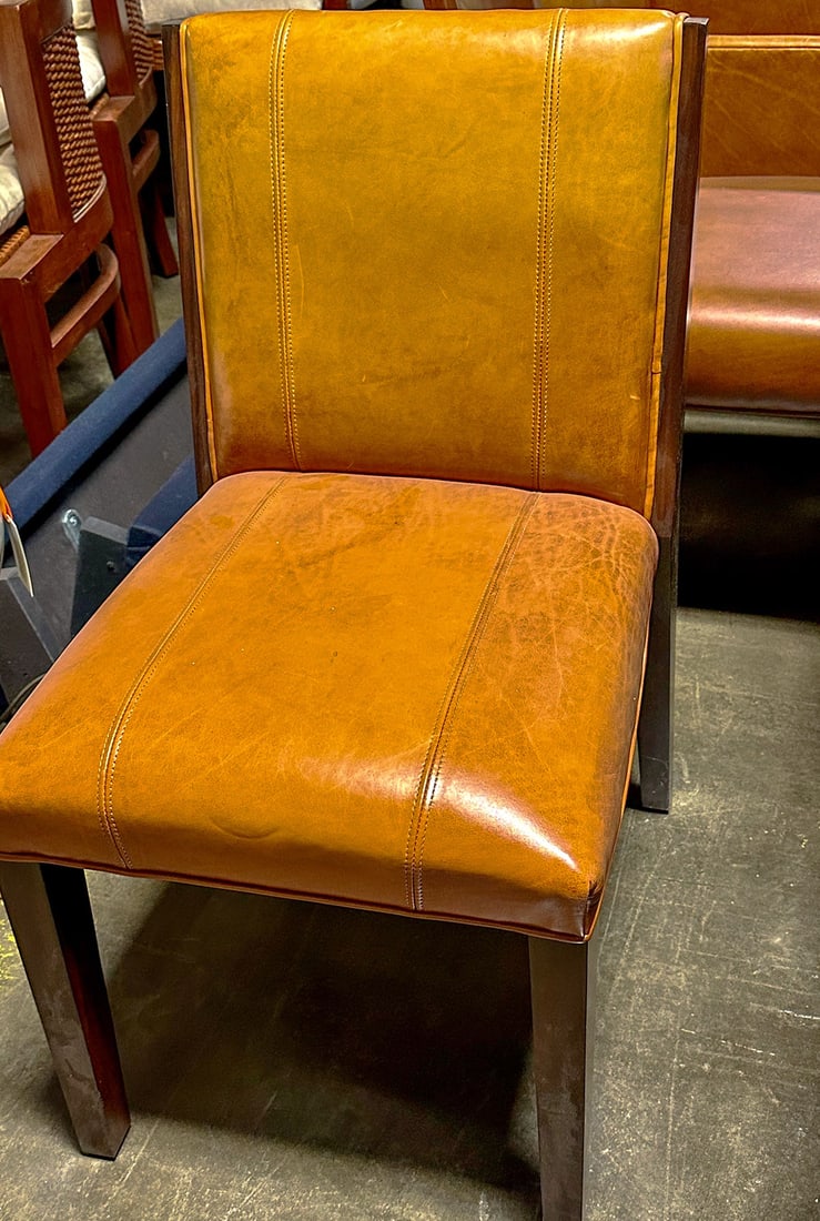Ralph Lauren Modern Metropolis Dining Side Chair: A distinctive chair features canted rear legs with upholstered seat and back. Dimensions 19"W x 24"D x 35"H. This item will need to be shipped by a packing company of your choice. We maintain a list o