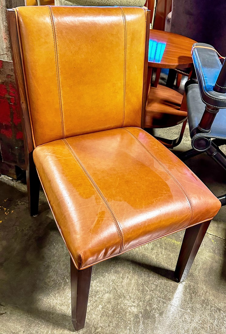 Ralph Lauren Modern Metropolis Dining Side Chair: A contemporary styled chair with rosewood legs. Dimensions 23"W x 24"D x 36"H. This item will need to be shipped by a packing company of your choice. We maintain a list of reliable shippers, or you ma