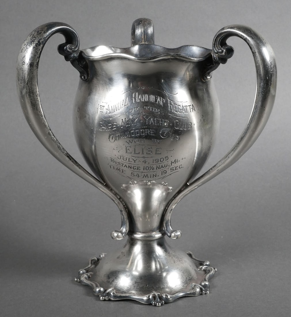 1905 Sterling Silver Yacht Club Trophy Loving Cup: Sterling silver loving cup trophy for the winner of the first annual race at the Cape May Yacht Club (now the Corinthian) in New Jersey. Measures 8" high and weighs 14.4 Troy ounces. Hallmarked Redlic