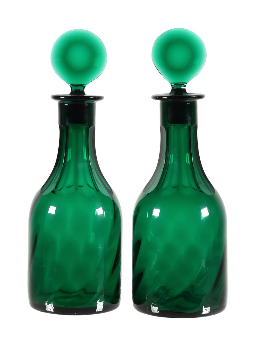 George III Bristol Green Glass Mallet Decanters: Rare pair of matched Georgian Bristol green mallet decanters with original bullseye stoppers. Early 1800s. Ground pontils. Each measures about 11-1/2" high. This item can be shipped in-house.