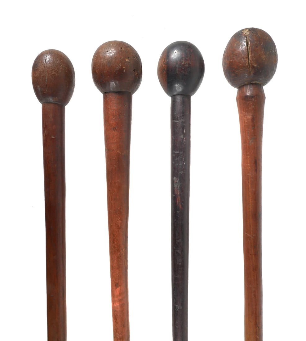 AFRICAN WAR CLUBS 4PCS: Group of four African carved wood war clubs / rungu / throwing clubs / knobkerrie / war or ceremonial weapons. Zulu East African Niger Congo Central Africa. Longest measures about 44-1/2". This item w