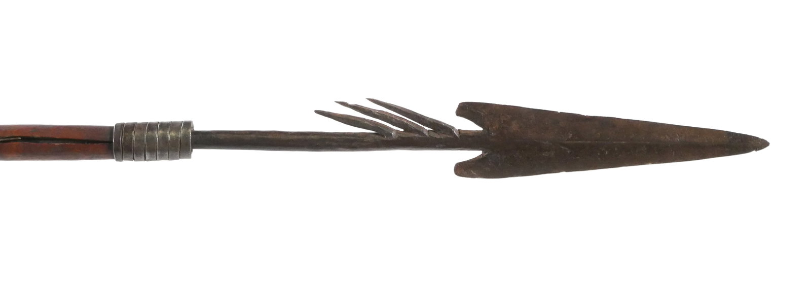 SUDANESE SPEAR MAHDIST PERIOD: Circa 1885, Sudanese hunting or fishing barbed spear. Wood haft with the base carved in bands and wrapped iron socket below the medial ridged triangular point with three large barbs below. Overall len