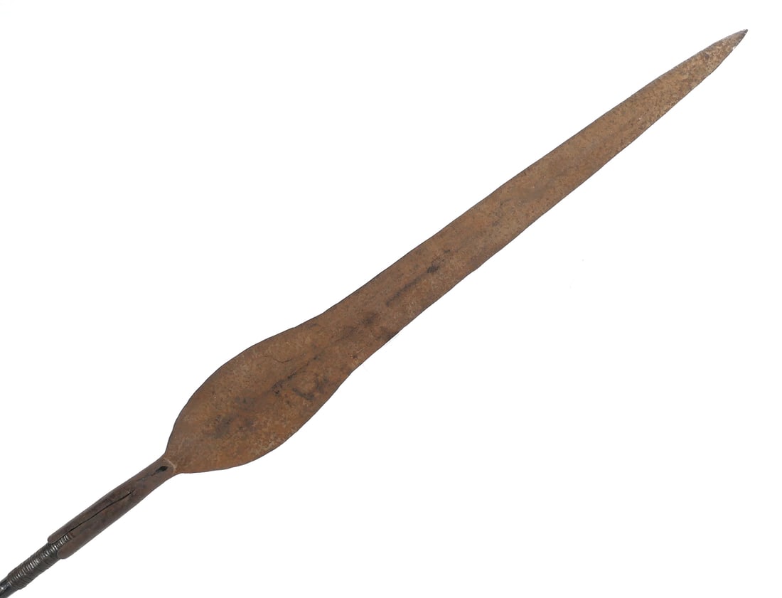 Antique African Spear: Carved and wrapped handle. Measures about 56-3/4" long. This item will need to be shipped by a packing company of your choice. We maintain a list of reliable shippers, or you may choose your own.