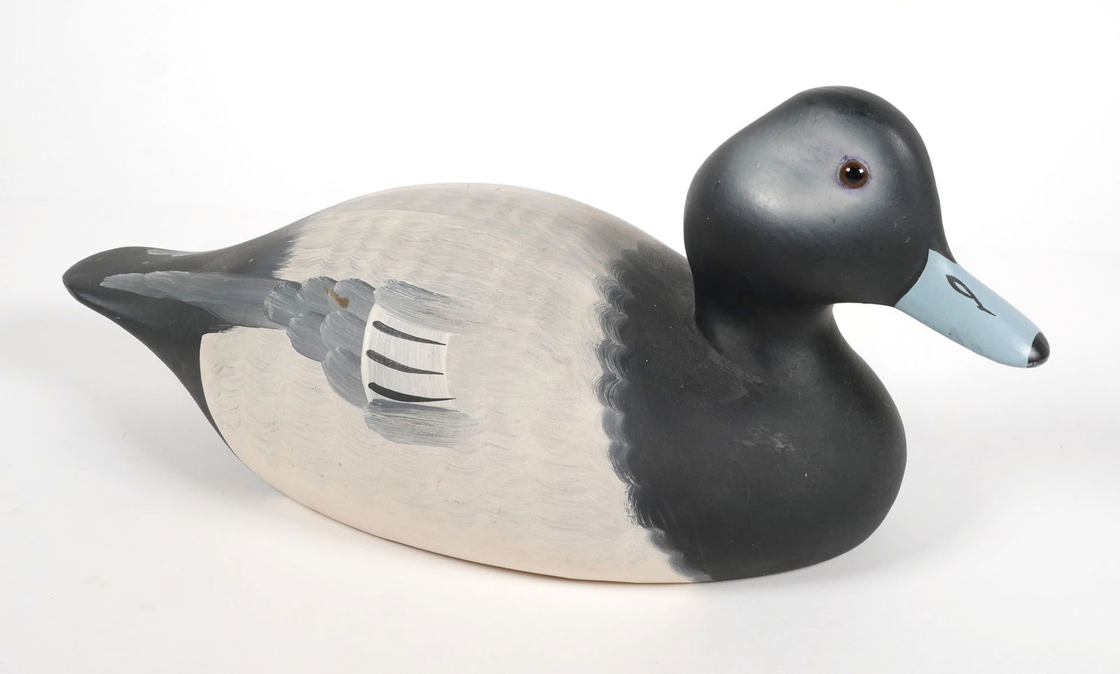 DUCK DECOY RAYMOND HORNICK BROS: Vintage hand carved and painted duck decoy with glass eyes by Raymond Hornick / Hornick Bros. Stoney Point Decoys, Oak Hall Virginia, dated 1980.Overall approx. 13"L x 6"H. This item can be shipped in