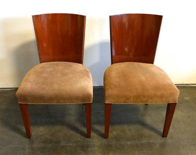 Ralph Lauren Modern Hollywood Dining Chair (Pair): RL Number: 1603-28. This elegant barrel-back walnut armchair has a curvilinear form. Finish: Hollywood Walnut. Materials: Alder solids, walnut veneer. Dimensions: 20 3/4"W x 22 3/4"D x 34 1/4"H. Seat