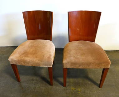 Ralph Lauren Modern Hollywood Dining Chair (Pair): RL Number: 1603-28. This elegant barrel-back walnut armchair has a curvilinear form. Finish: Hollywood Walnut. Materials: Alder solids, walnut veneer. Dimensions: 20 3/4"W x 22 3/4"D x 34 1/4"H. Seat