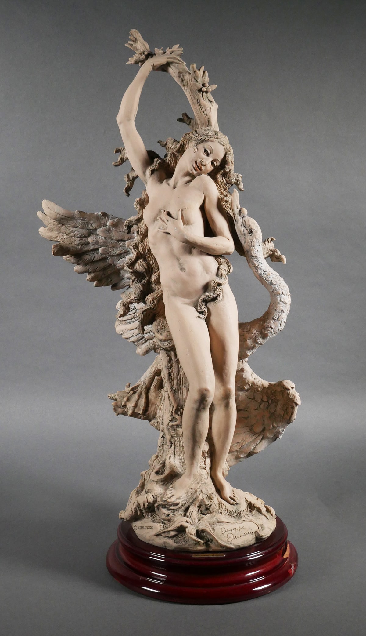 Giuseppe Armani LEDA WITH SWAN Sculpture: Signed Giuseppe Armani "Leda with Swan" figure #1012/T. Limited edition figurine 783/1500. Capodimonte porcelain mark on base, dated 1993, Florence. Sculpture measures approx. 23" tall x 12" x 9-1/2"