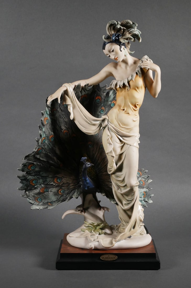 Giuseppe Armani ISADORA Sculpture: Signed Giuseppe Armani "Isadora", lady with peacock figure #633/C. Limited edition figurine 1031/3000. Capodimonte porcelain mark on base, dated 1994, Florence. Sculpture measures approx. 18-1/2" tall